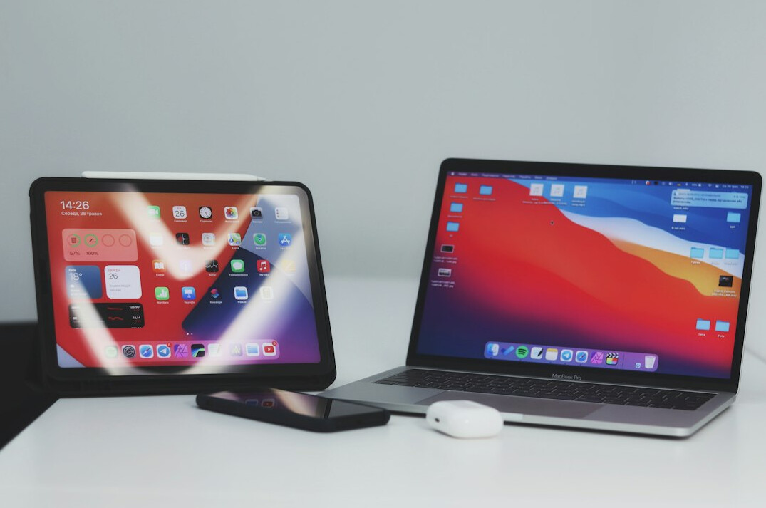Laptop and tablet mockup showing a coding course dashboard interface