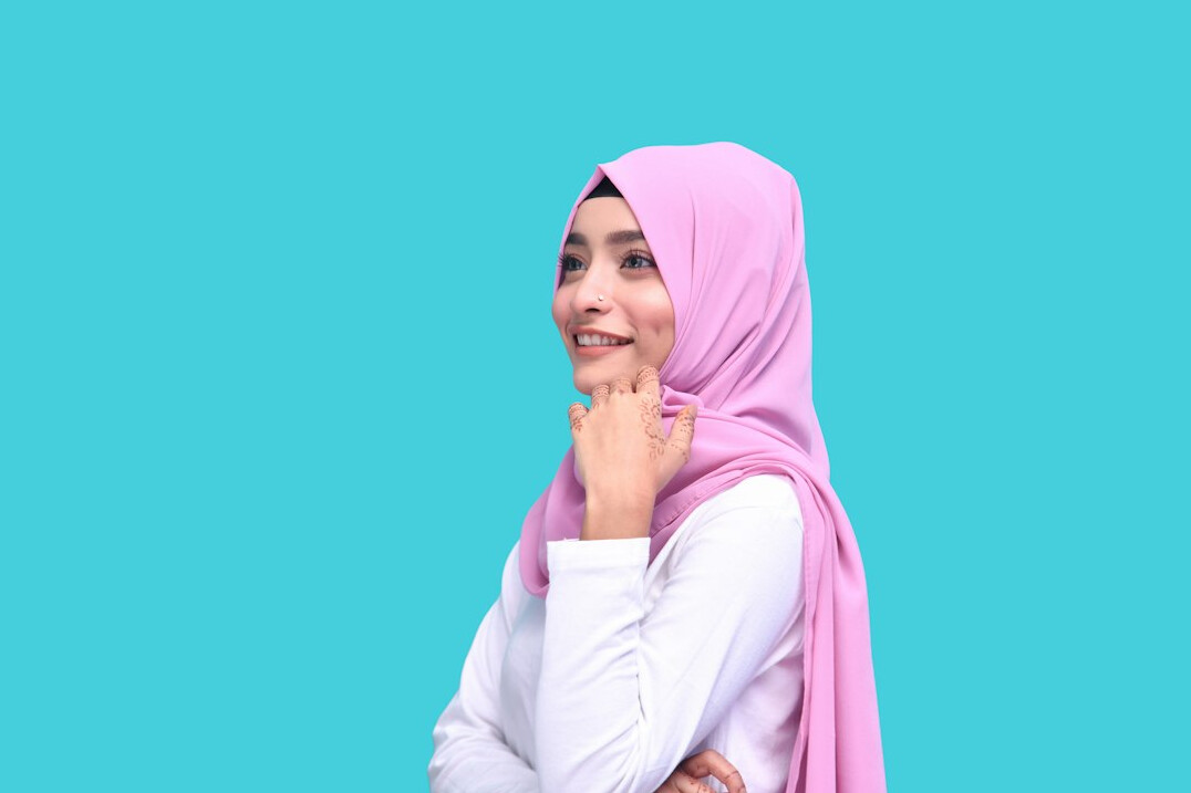Portrait of a Malay woman wearing a hijab smiling, data science instructor
