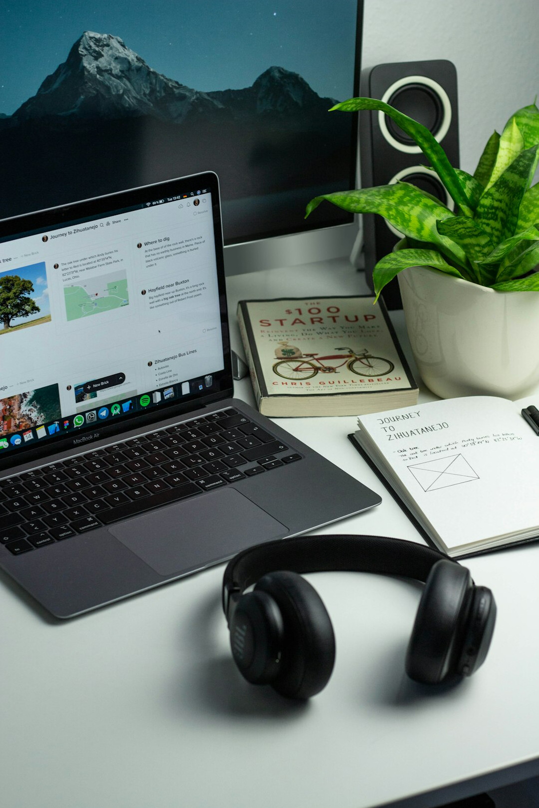 books and laptop on desk