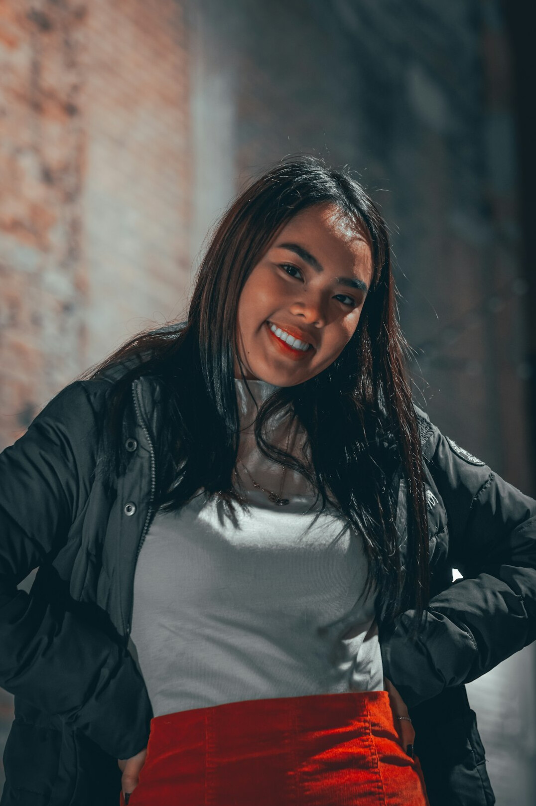 Portrait of an Indian-Malaysian woman smiling, UX design and career coach
