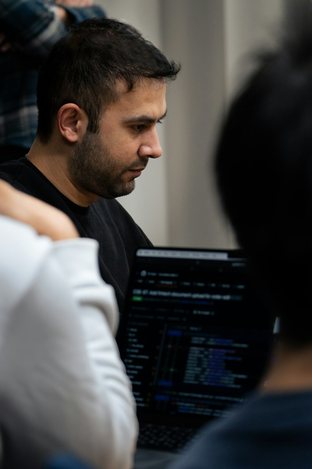 team reviewing code together